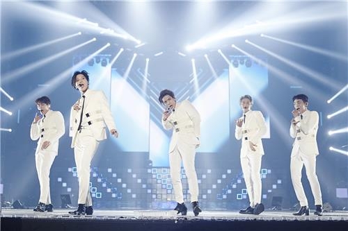 SHINee performs at Olympic Park in Seoul in this photo provided by S.M. Entertainment. (Yonhap)