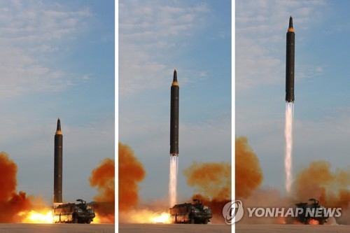 This composite photo, released by North Korea's official Korean Central News Agency, shows the launch of a Hwasong-12 intermediate-range ballistic missile. (For Use Only in the Republic of Korea. No Redistribution) (Yonhap)