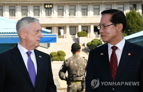 U.S. Secretary of Defense James Mattis visits the Demilitarized Zone (DMZ) with South Korean Defense Minister Song Young-moo on Oct. 27, 2017, in this photo provided by the Joint Press Corps. (Yonhap)