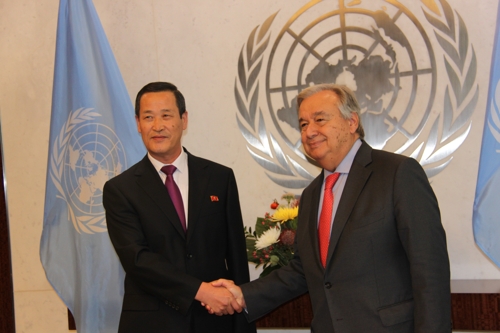 Kim Song (L), North Korea's new ambassador to the U.N., shakes hands with U.N. Secretary-General Antonio Guterres at the U.N. headquarters in New York on Sept. 20, 2018. (Yonhap)