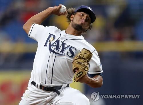 In this Getty Images file photo from Aug. 31, 2019, Ricardo Pinto, then with the Tampa Bay Rays, pitches against the Cleveland Indians in the top of the eighth inning of a Major League Baseball regular season game at Tropicana Field in St. Petersburg, Florida. (Yonhap)