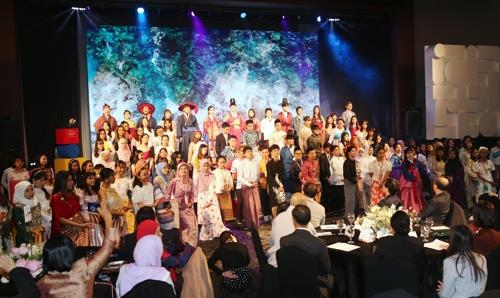 ASEAN students wearing their own traditional clothes perform a musical during an awards ceremony of the 2019 Korean Speech Contest in Busan on Nov. 26, 2019, in this photo provided by the education ministry. (PHOTO NOT FOR SALE) (Yonhap)