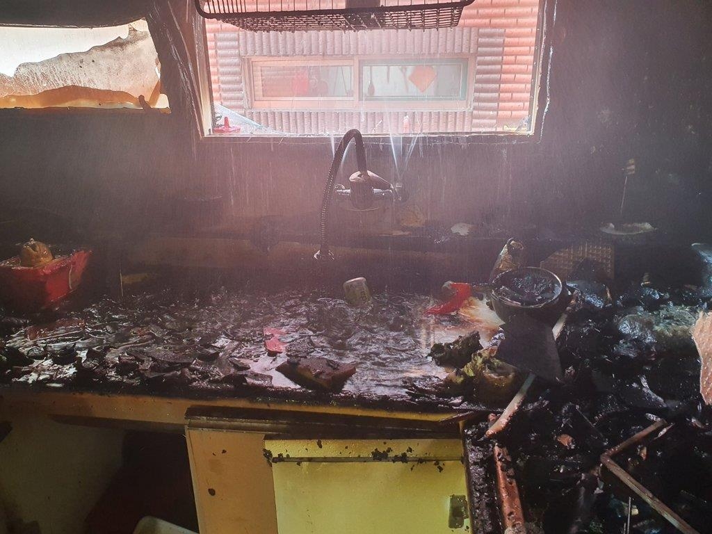 This photo provided by the Incheon Nambu Fire Station shows the burned down home of the two young boys in Incheon. (PHOTO NOT FOR SALE) (Yonhap)