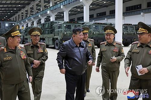 (LEAD) N. Korean leader inspects new tactical missile system