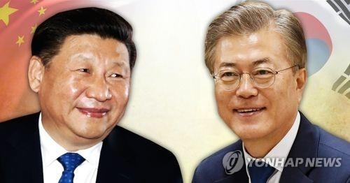 習主席（左）が文大統領に韓中関係発展へのメッセージを送った（イメージ）＝（聯合ニュース）