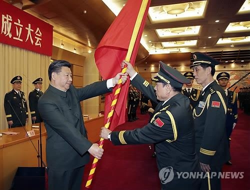 "中 군개편 후에도 육군 출신 요직 장악…정치적 타협 결과" - 2