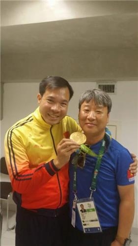 <올림픽> 한국인 사격 감독, 베트남에 사상 첫 올림픽 금메달 선물 - 2