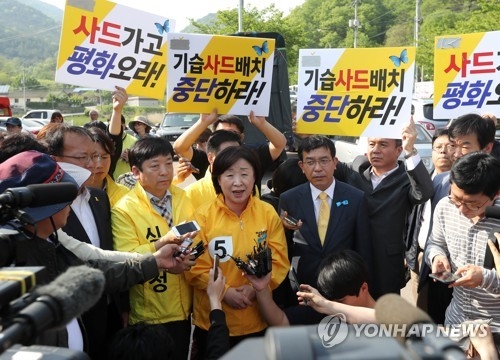 질문에 답하는 심상정