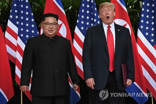 공동합의문에 서명한 북미 정상