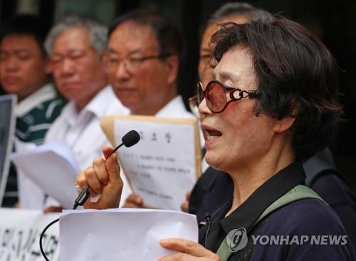 KAL858기 폭파사건 유족들, 김현희 명예훼손으로 고소