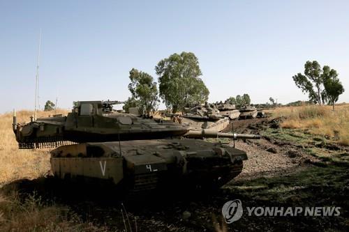 (AFP=연합뉴스) 지난 2일(현지시간) 이스라엘 점령지 골란고원에 배치된 이스라엘군 탱크.
