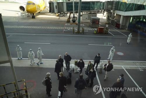 '코로나19 기원 밝혀질까' 중국 우한 도착한 WHO 조사팀