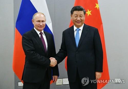 블라디미르 푸틴 러시아 대통령(왼쪽)과 시진핑 중국 국가주석 [AP=연합뉴스 자료사진]