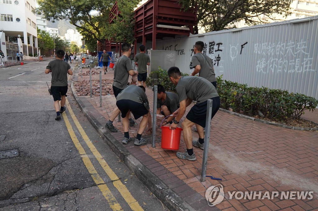 CORRECTION-HONG KONG-CHINA-POLITICS-UNREST