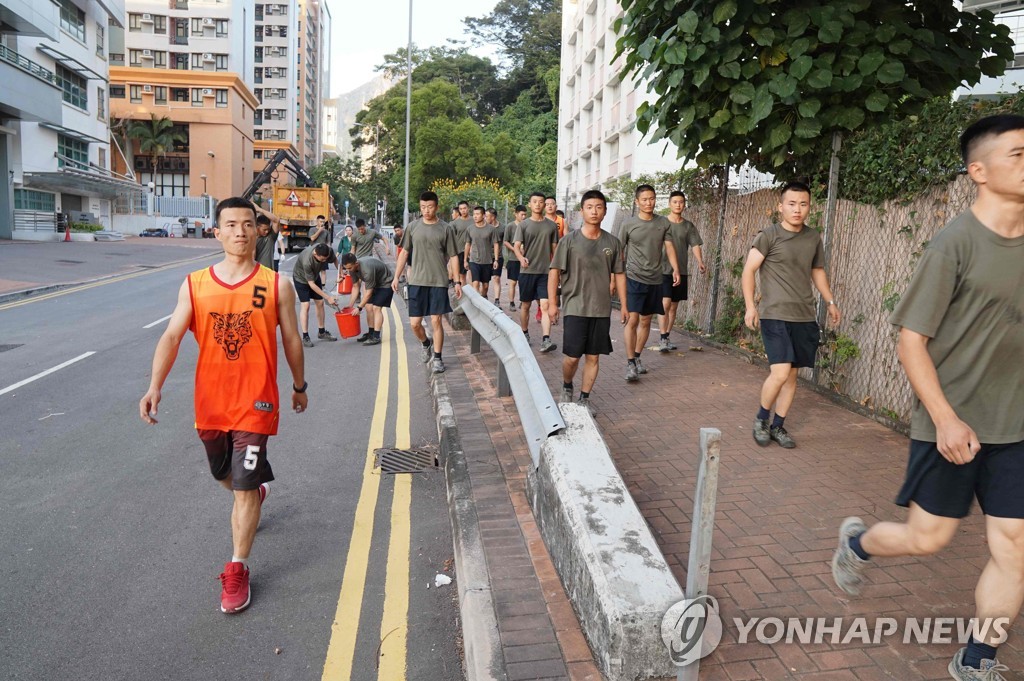 CORRECTION-HONG KONG-CHINA-POLITICS-UNREST