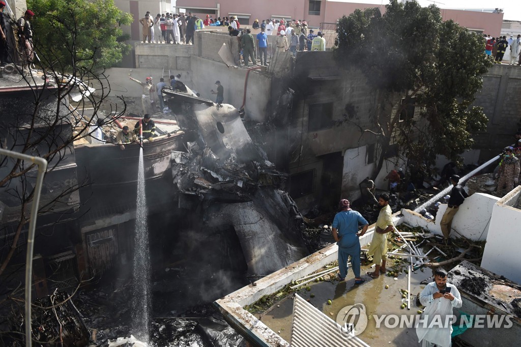 TOPSHOT-PAKISTAN-AVIATION-ACCIDENT
