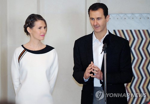 아사드 시리아 대통령(오른쪽)과 부인 아스마