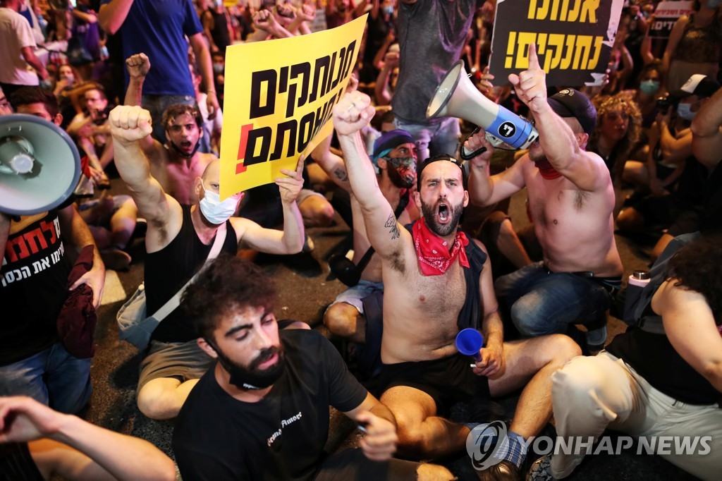 HEALTH-CORONAVIRUS/ISRAEL-PROTESTS