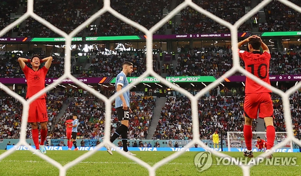 SOCCER-WORLDCUP-URY-KOR/REPORT