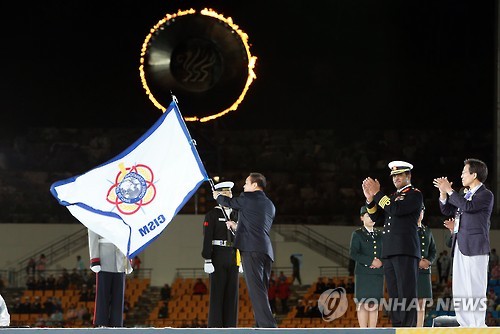 '대회기는 다음 개최지로'