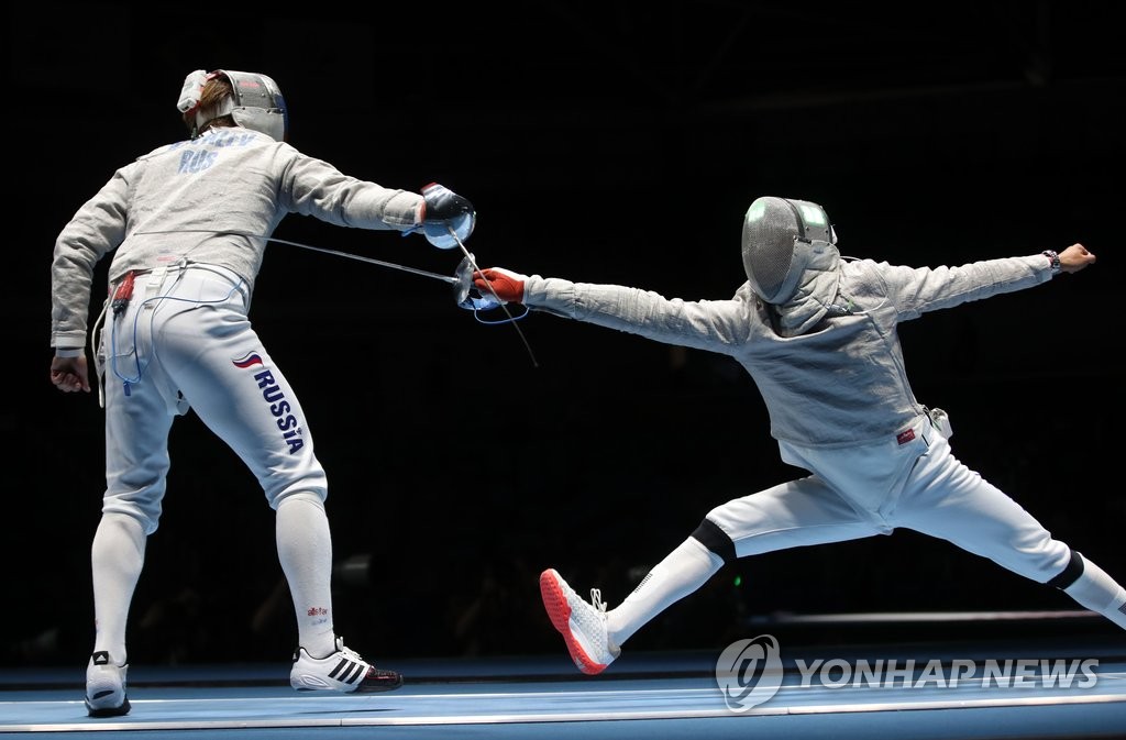 <올림픽> 찌르고