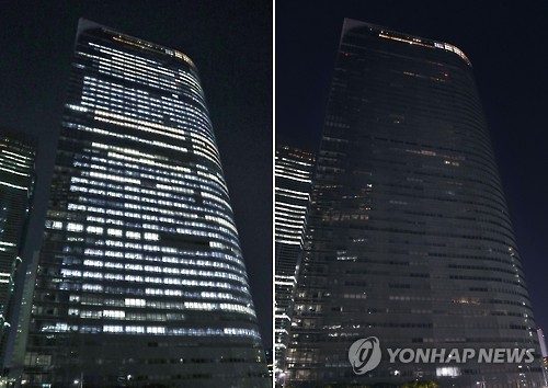과로사 파문에 밤 10시 불 끈 일본 덴쓰 본사