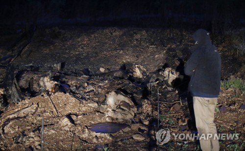 산불 지역에 내리는 비