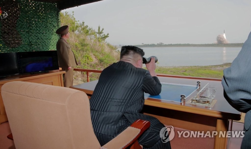 북한 TV, 화력타격 훈련 사진 공개