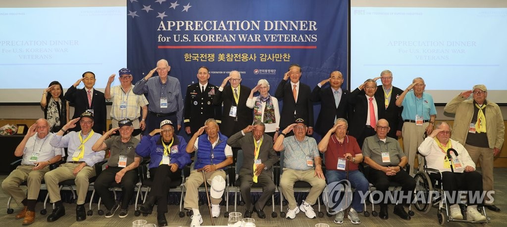 FKI chief with U.S. Korea War veterans FKI chief with U.S. Korea War veterans