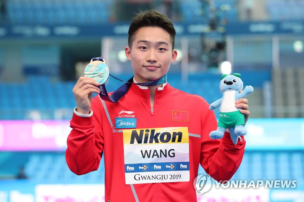 Winner of men's springboard diving Winner of men's springboard diving
