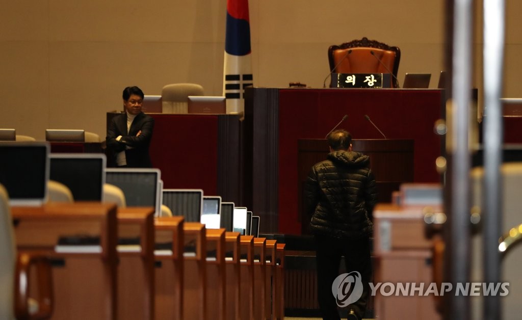 Lawmakers of the main opposition Liberty Korea Party continue their protest sit-in at the National Assembly in Seoul on Dec. 11, 2019, after the passage of next year's budget bill the previous night. (Yonhap)