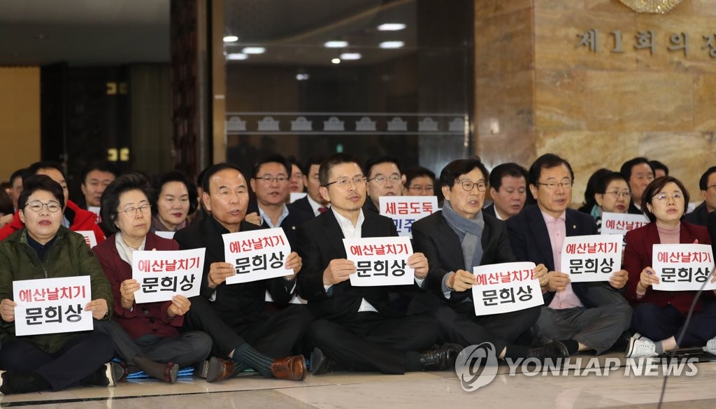 Protest over budget bill's passage Protest over budget bill's passage