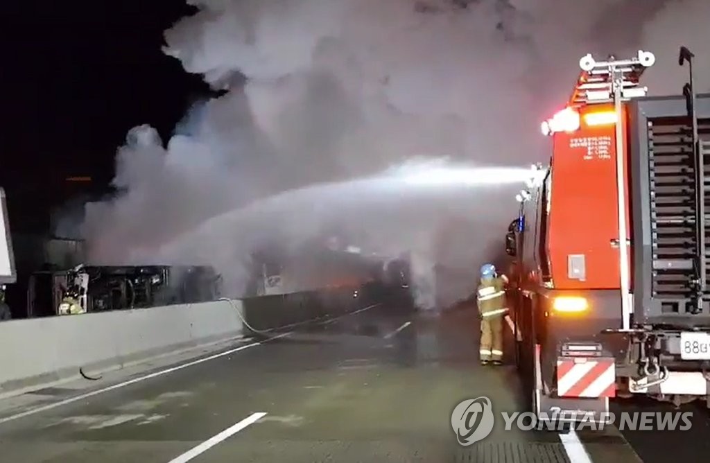 Firefighters put out flames in multiple vehicle crash Firefighters put out flames in multiple vehicle crash