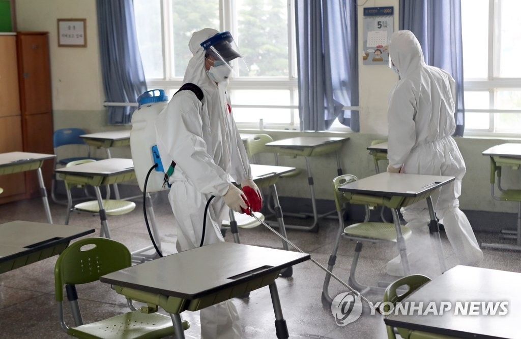 Disinfection under way at Busan high school Disinfection under way at Busan high school