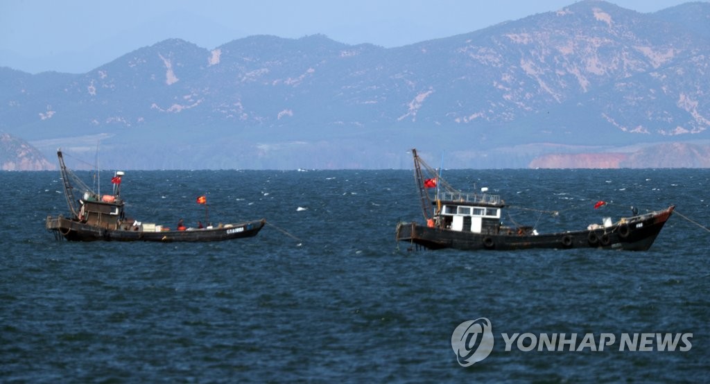 Chinese fishing boats near sea border Chinese fishing boats near sea border