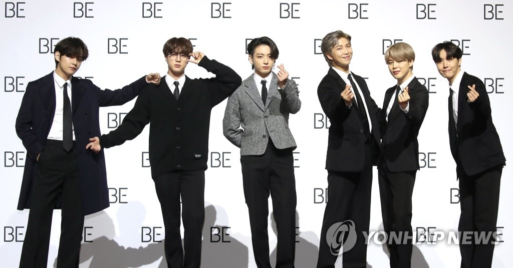 Members of K-pop group BTS pose for a photo shoot ahead of a press conference held at the Dongdaemun Design Plaza in central Seoul on Nov. 20, 2020. (Yonhap)