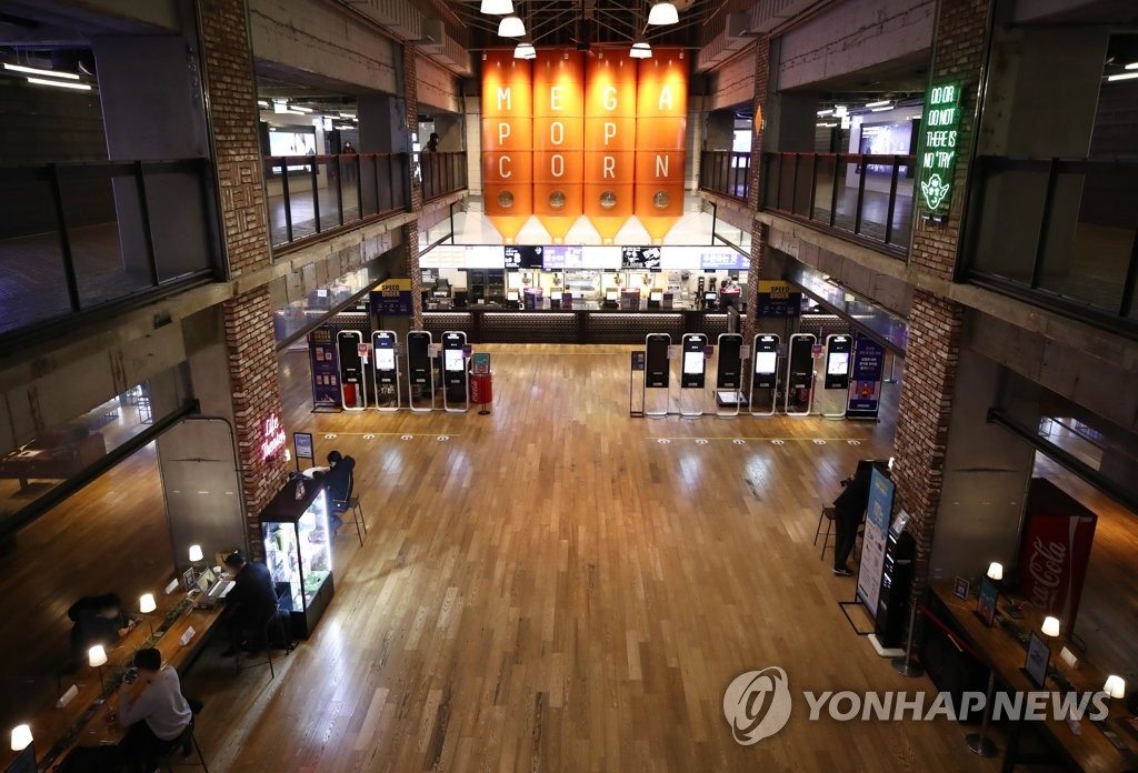 In this file photo taken on Feb. 24, 2021, a Seoul movie theater is relatively empty. (Yonhap)