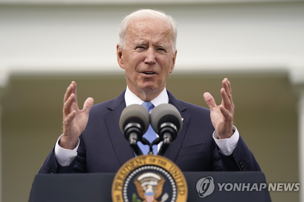 This photo, released by the Associated Press on May 13, 2021, shows U.S. President Joe Biden speaking at the White House in Washington. (Yonhap)
