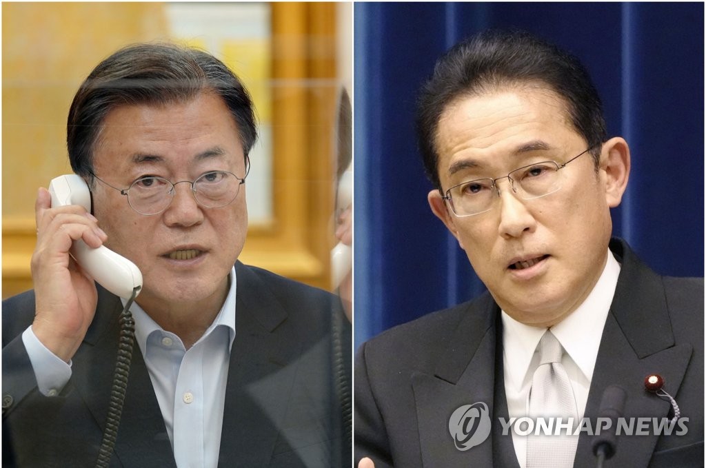 (LEAD) Moon, Kishida agree to accelerate diplomatic consultations to resolve forced labor row - 1