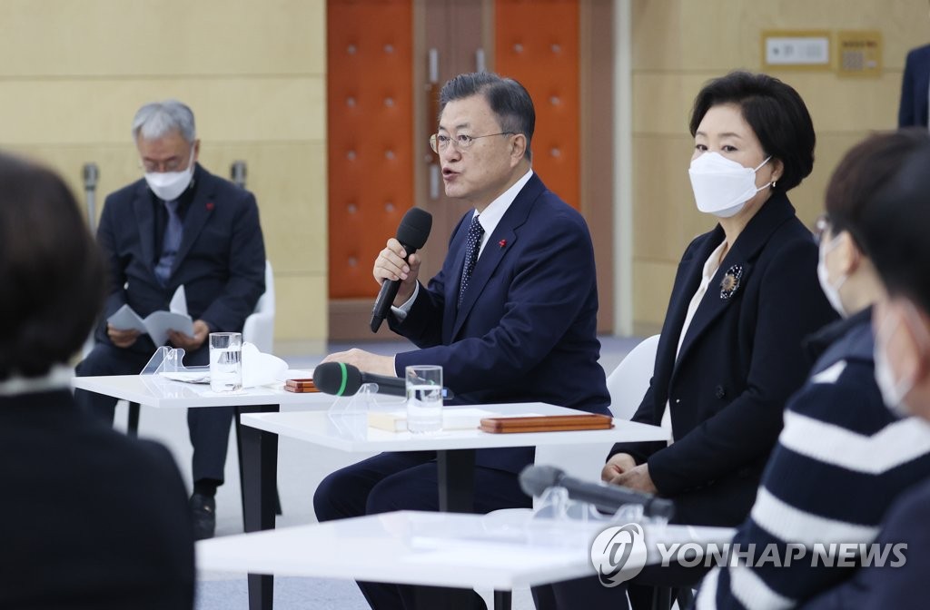 President Moon Jae-in speaks at a meeting over the launch of a national vocational school for the disabled during a visit to Kongju National University in Gongju, 160 kilometers south of Seoul, on Dec. 29, 2021. (Yonhap)