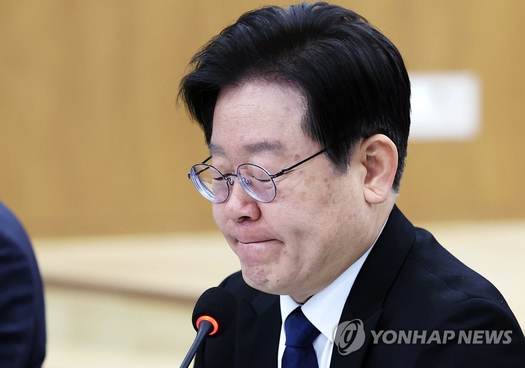 The main opposition Democratic Party leader Lee Jae-myung makes a solemn face while speaking at a party meeting held in the Gyeonggi provincial assembly in Suwon, 34 kilometers south of Seoul on March 10, 2023. (Yonhap)