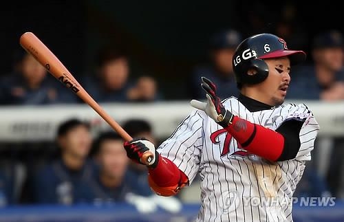 12th Oct, 2020. LG Twins' Park Yong-taik LG Twins' Park Yong-taik (L)  celebrates after hitting a single against the NC Dinos at a Korea Baseball  Organization league match at Jamsil Baseball Stadium