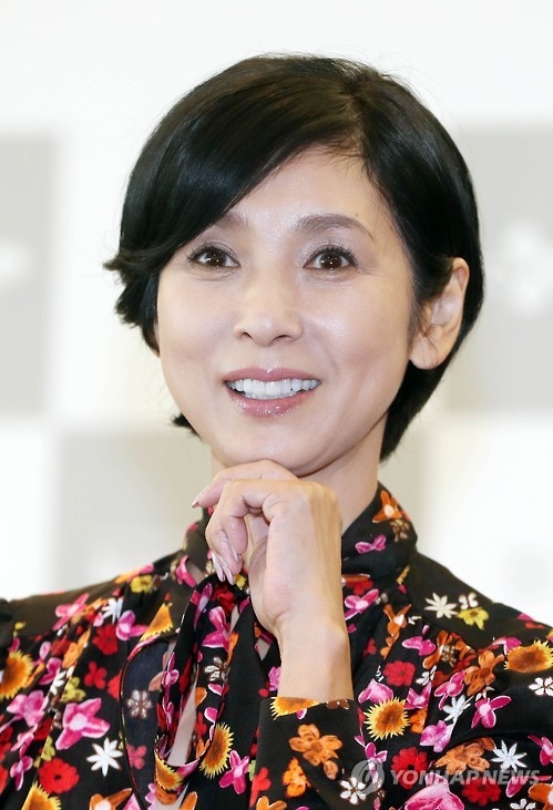 Japanese film director and actress Hitomi Kuroki attends a press conference for drama film "Desperate Sunflowers" in Busan, 450 kilometers southeast of Seoul, on Oct. 7, 2016. (Yonhap)