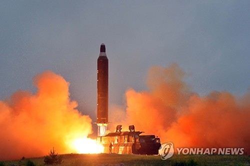 This photo from North Korea's Rodong Sinmun, the ruling party newspaper, on June 23, 2016, shows a Hwasong-10 ballistic missile -- known as the intermediate-range Musudan to the outside world -- being launched near Wonsan on the east coast. (For Use Only in the Republic of Korea. No Redistribution) (Yonhap)