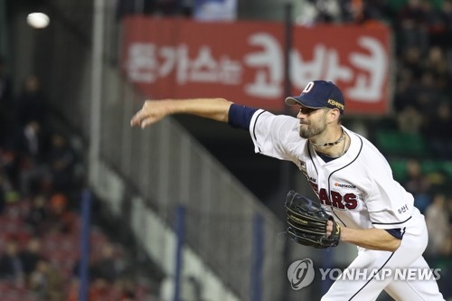 Pitcher Lee Hyun-Seung of Doosan Bears throws in the top of the News  Photo - Getty Images