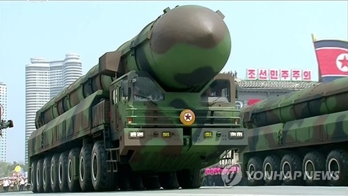 North Korea unveils what seems to be a new intercontinental ballistic missile (ICBM) at a military parade in Pyongyang on April 15, 2017 in a photo from North Korean TV footage. (Yonhap) [For Use Only in the Republic of Korea. No Redistribution]