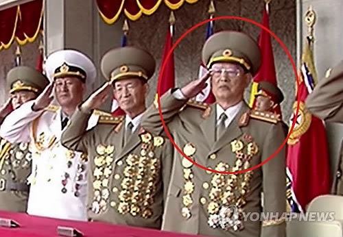 This image, captured from footage of North Korea's state-run TV station on April 15, 2017, shows Kim Won-hong, circled in red, who is known to have been dismissed from the country's office of spy chief early this year. He made his first public appearance since the reported dismissal in mid-January at a military parade held to mark the 105th birthday of late founder Kim Il-sung. (For Use Only in the Republic of Korea. No Redistribution) (Yonhap)