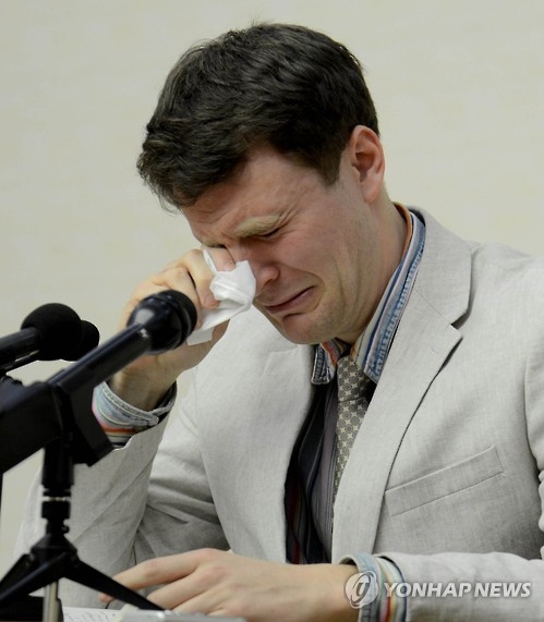 Otto Frederick Warmbier, a University of Virginia student who was detained in North Korea since January 2016, cries during a press conference at the People's Palace of Culture in Pyongyang on Feb. 29, 2016, in this photo released by the North's official Korean Central News Agency. Warmbier admitted to his "severe" crime of stealing a political sign from a hotel and asked for forgiveness, according to KCNA. (For Use Only in the Republic of Korea. No Redistribution) (Yonhap)