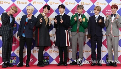 In this file photo, members of boy band BTS pose for photos at a K-pop festival hosted by SBS in Seoul on Dec. 25, 2017. (Yonhap)