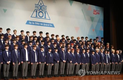 The 101 boys and young men who will compete in the fourth season of "Produce 101," an idol competition show by Mnet, pose for photos during a press conference on April 30, 2019. (Yonhap) 